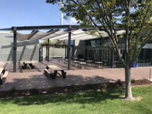 Draped Metal Mesh Canopy Shades Outdoor Eating Space at High Profile Class A Office Building in Silicon Valley